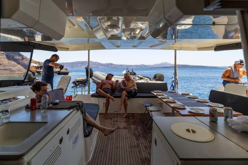 Santorini: Catamaran Cruise with Fresh Meal & Open Bar - Volcano-Adjacent Stops: Sea-Level Views Without the Hike