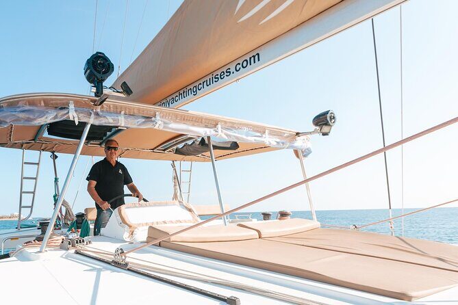 Santorini Catamaran Cruise: with Lunch, BBQ, Open Bar, Transfers - Crew and Group Size: The Calmer Kind of Catamaran