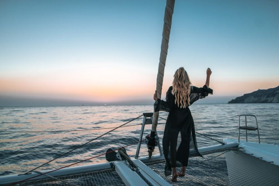 Santorini: Catamaran Cruise with Meal & Open Bar - Red Beach and White Beach: the classic volcanic swim setup