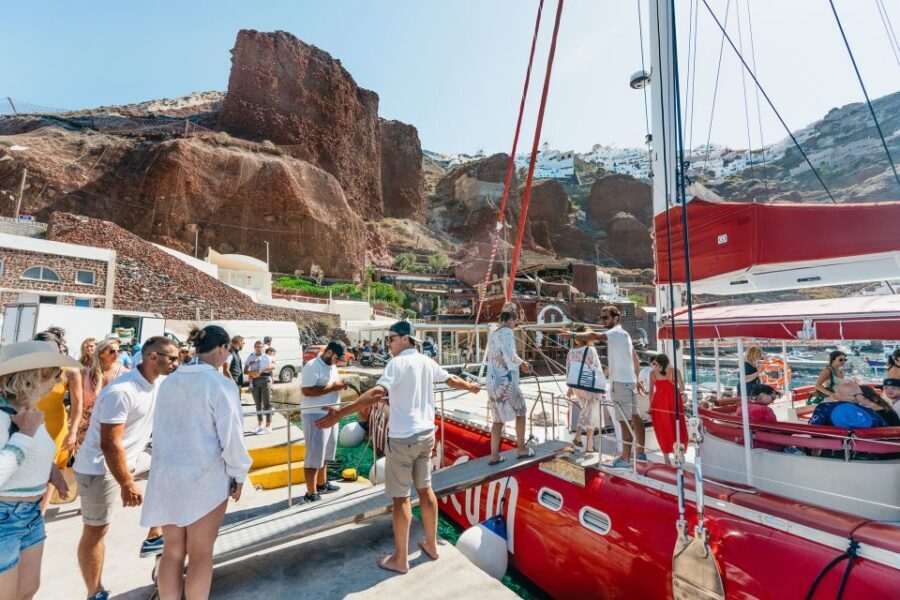Santorini: Catamaran Tour with BBQ Dinner, Drinks, and Music - Hot Springs First: Warm Water and Volcanic Views Without the Land Hassle