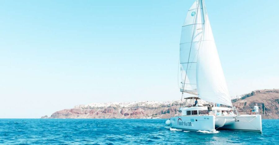 Santorini: Catamaran Tour with BBQ Meal and Unlimited Drinks - Hot Springs swim: warm volcanic water with caldera views