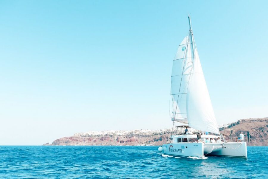 Santorini: Catamaran Tour with BBQ Meal and Unlimited Drinks - Food, drinks, and onboard comfort: it’s more than a snack cruise