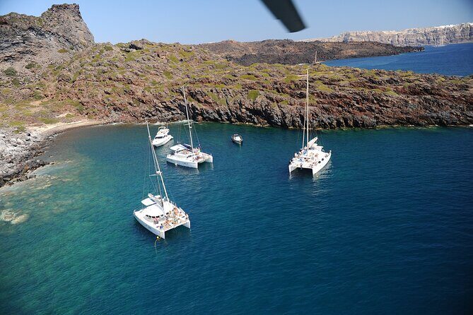 Santorini Classic Catamaran Cruise with BBQ, Drinks and Transfers - Palea Kameni Hot Springs: A Different Kind of Swim