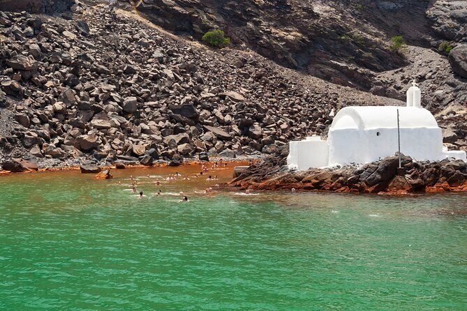 Santorini Classic Catamaran Cruise with BBQ, Drinks and Transfers - BBQ, White Wine, and a Final Swim at the Caldera Anchorage