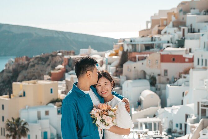 Santorini: Customized Private Photoshoot Walk in Oia - Posing Help for Blue Domes and Windy Moments