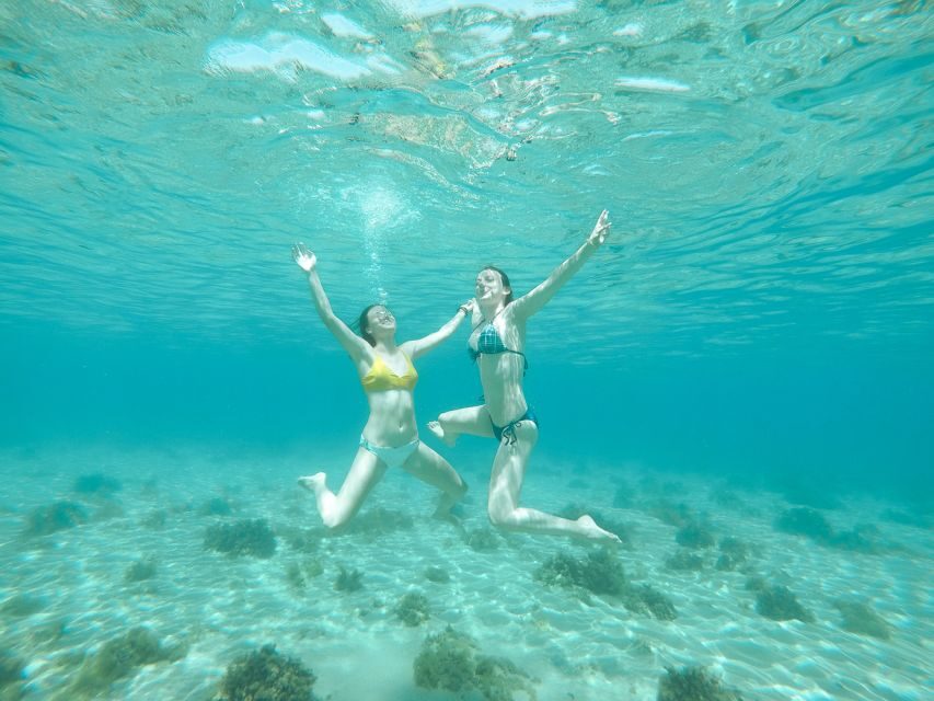 Santorini: Day Cruise with Meal & Open Bar - Volcanic Islands and Hot Springs: The Most Santorini Moment