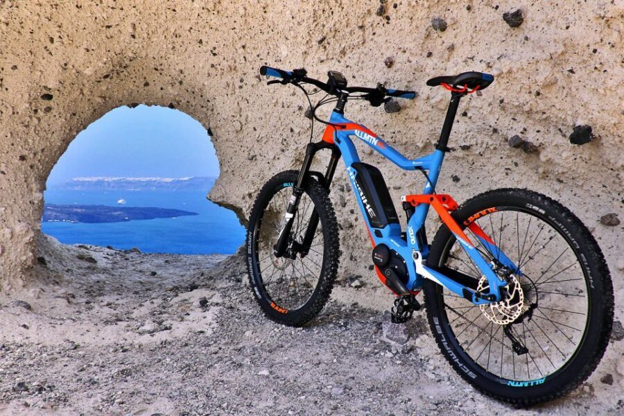 Santorini: Electric Mountain Bike Adventure - Emporeio’s medieval maze village: orange juice and castle vibes
