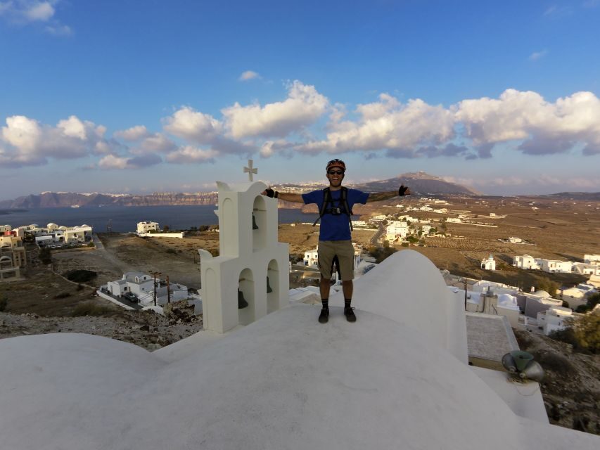 Santorini: Electric Mountain Bike Adventure - Perivolos warmup and ancient Thira riding: starting on black sand