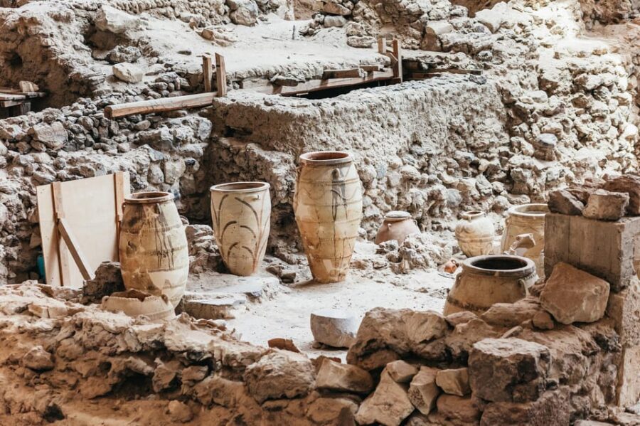 Santorini: Experience Akrotiri with a Licensed Tour Guide - Inside the buildings: 2–3 storeys, kitchens, toilets, and a drainage system