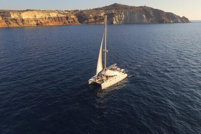 Santorini Full Day Catamaran Private Cruise incl. Meal, Drinks & Free Transport - Faros Lighthouse: Small Stop, Strong Panoramic Payoff