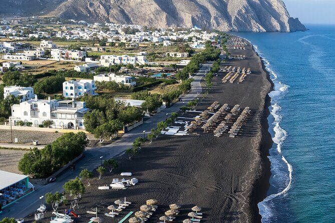 Santorini Full Day Trip by Santo Luxury Escape - Lighthouse views and Perissa black sand: sea air at both ends