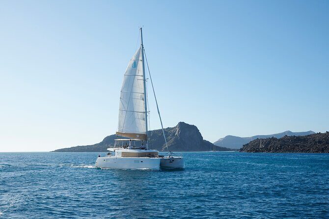 Santorini Gold Catamaran Cruise with BBQ, Drinks and Hotel Pickup - Santorini Volcano and Hot Springs: The Part That Might Surprise You