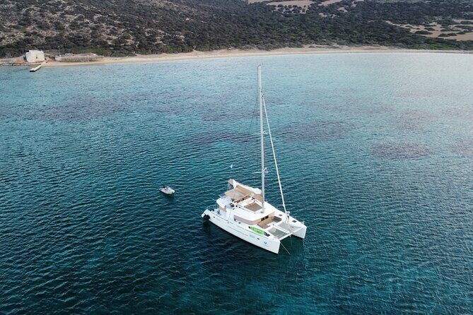 Santorini Gold Catamaran Cruise with BBQ, Drinks and Hotel Pickup - Mesa Pigadia Beach: Where Lunch or Dinner Hits After Swimming