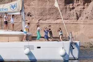 Santorini Gold Catamaran Cruise with Snorkel, BBQ & Open Bar - Open white wine bar and BBQ: why this half-day feels like a deal