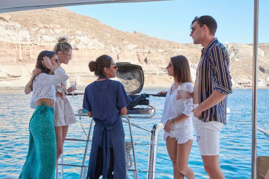 Santorini Gold Catamaran Cruise with Snorkel, BBQ & Open Bar - Volcano hot springs swim: sulfur water tips that save your gear