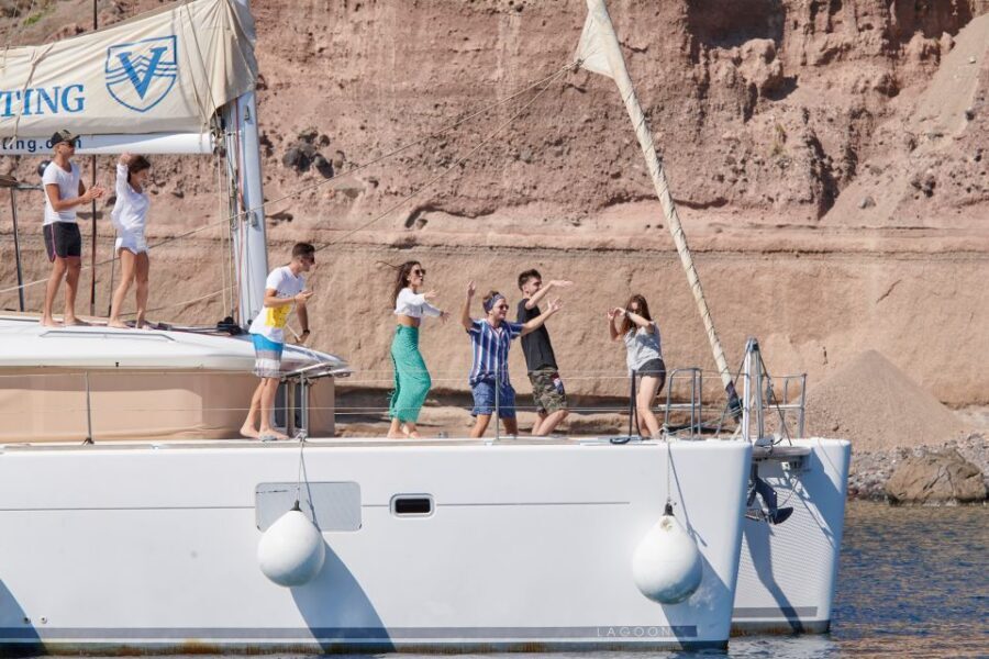 Santorini Gold Catamaran Cruise with Snorkel, BBQ & Open Bar - Open white wine bar and BBQ: why this half-day feels like a deal