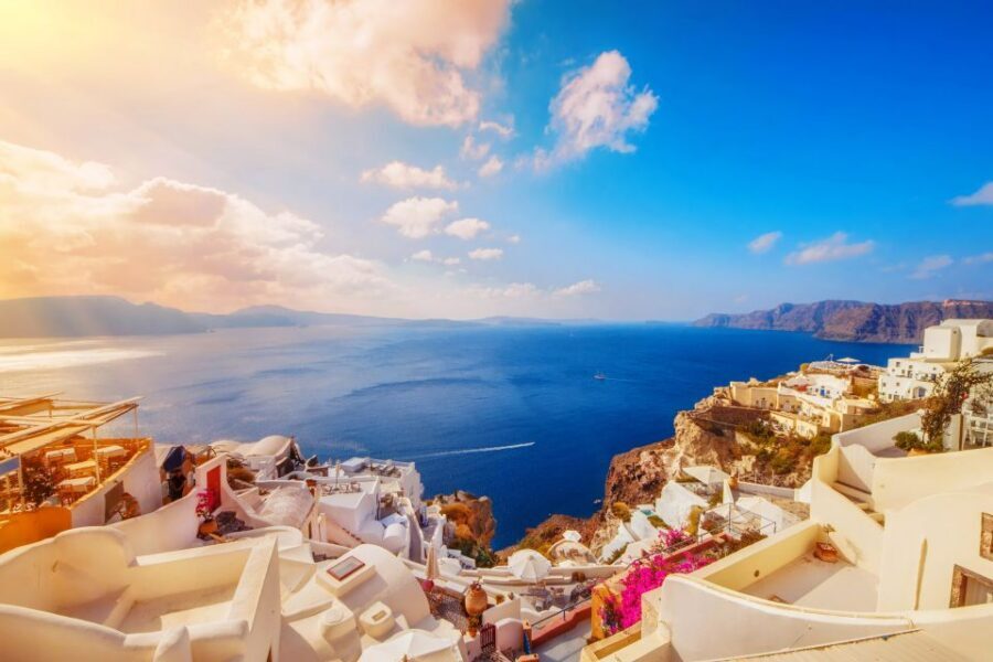 Santorini: Guided Island Day Trip with Beach Visit - Oia at sunset: the famous ending, timed for payoff