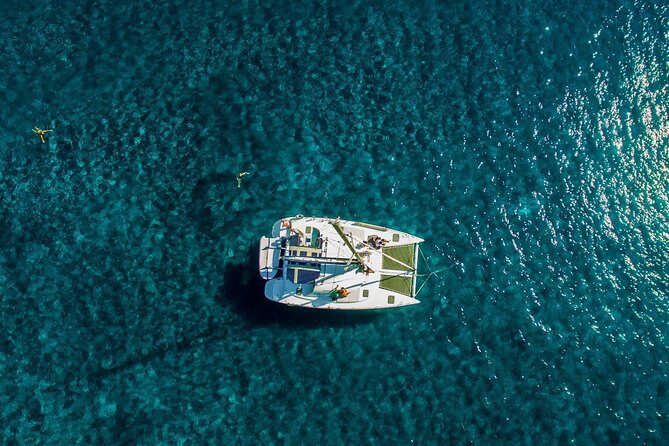 Santorini Half Day Catamaran Private Cruise incl. Meal, Drinks & Free Transport - Why a private catamaran works so well on Santorini