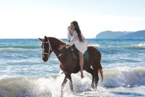 Santorini Horse Riding to Black Sandy Beach - Eros black beach: riding along volcanic sand and the waterline