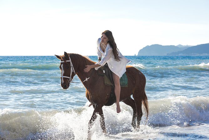 Santorini Horse Riding to Black Sandy Beach - Eros black beach: riding along volcanic sand and the waterline
