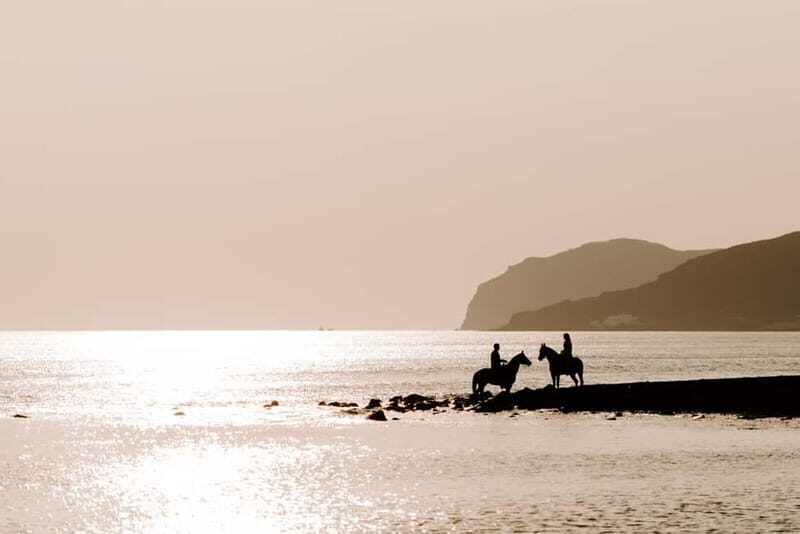 Santorini: Horseback Riding on the Black Sandy Eros Beach - Photo support: what you get, what you should bring, and how to time your shots