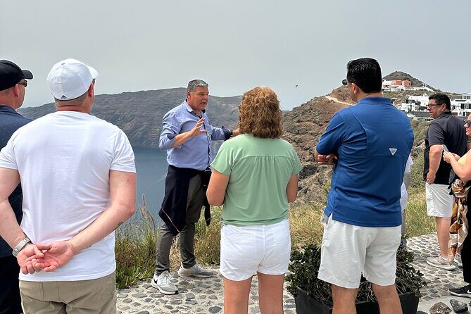 Santorini in 5 hours: Oia, Traditional Villages & Black Beach - Stop 1: Firostefani for caldera views and the blue-domed classic