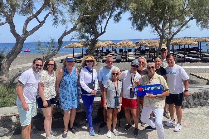 Santorini in 5 hours: Oia, Traditional Villages & Black Beach - Stop 5: Perivolos Black Beach for swimming and lunch options