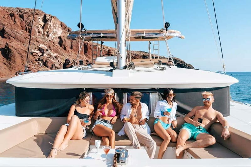 Santorini: Luxury Catamaran Cruise with Lunch, BBQ & Drinks - Mesa Pigadia Beach Stop: Your First Proper Swim Moment