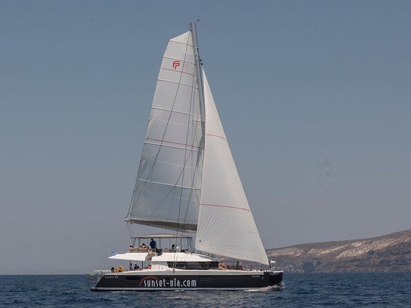 Santorini Luxury Catamaran Day Cruise with BBQ,drinks,transfer - Ammoudi Port start and the caldera route: what your morning feels like