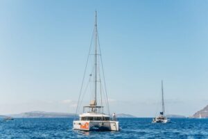 Santorini: Luxury Catamaran Day Trip with Meal and Open Bar - Pickup, boat comfort, and what “small group” really means