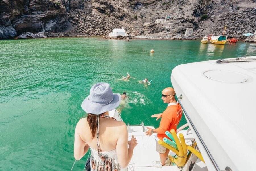 Santorini: Luxury Catamaran Day Trip with Meal and Open Bar - Lunch or dinner onboard: Greek plates with unlimited drinks