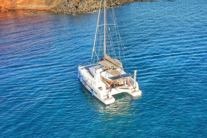 Santorini Luxury Catamaran Private Cruise - Sailing past the Red and White Beach area and the Caldera landmarks
