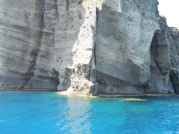Santorini Luxury Catamaran Sunset Cruise with BBQ, Drink and Transfer - Drinks and onboard comfort: included basics, plus the little extras