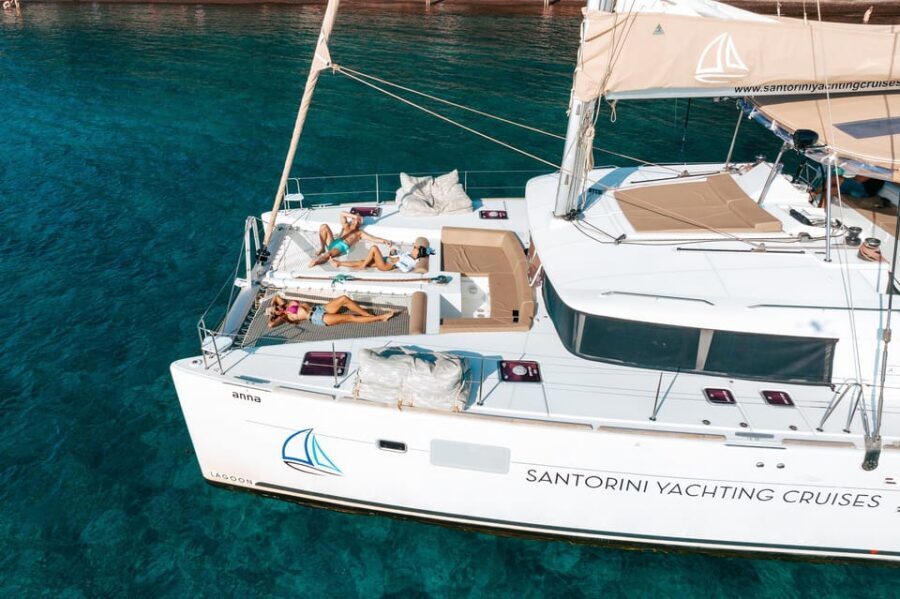 Santorini: Luxury Sunset Cruise with Dinner, BBQ, and Drinks - Palea Kameni hot springs: sulfur water, real comfort, and clothing tips