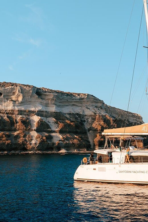 Santorini: Luxury Sunset Cruise with Dinner, BBQ, and Drinks - Food, open bar, and onboard comfort (Wi-Fi, restrooms, towels)