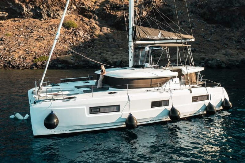 Santorini: Majestic Catamaran Cruise with Meal and Drinks - The onboard vibe: how the experience usually plays out