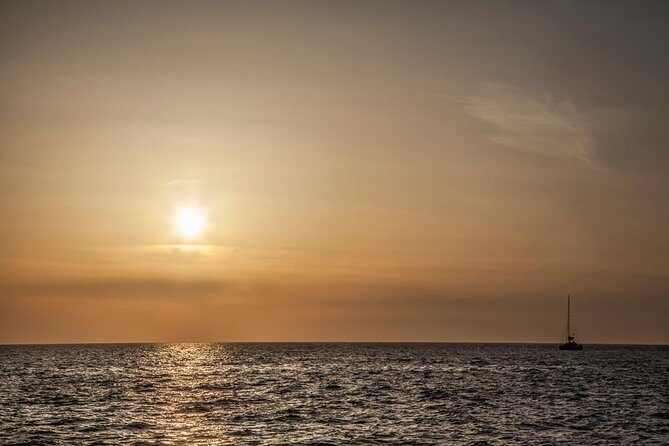 Santorini: Motor Yacht Sunset Cruise with 5-Course Dinner - Santorini Volcano Stop: 30 Minutes for Swimming and Snorkeling