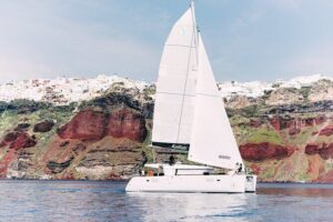 Santorini Oia: Caldera Classic Day Cruise with Snacks & Drinks - Stop 1: Thirassia Island swimming in calmer water near Oia