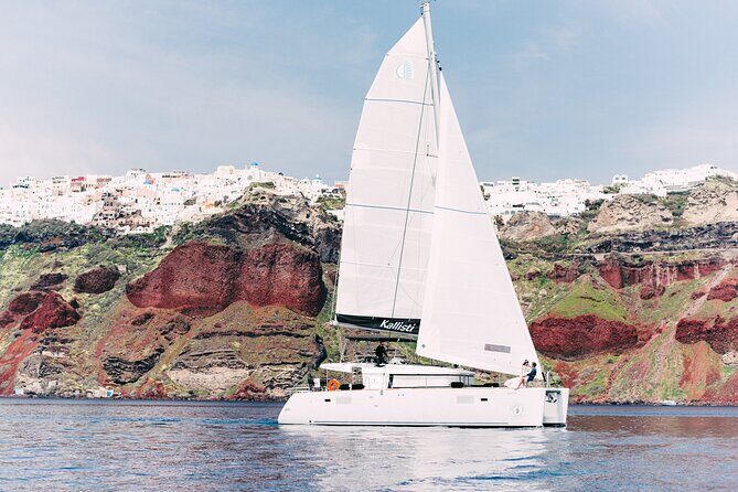 Santorini Oia: Caldera Classic Day Cruise with Snacks & Drinks - Stop 1: Thirassia Island swimming in calmer water near Oia