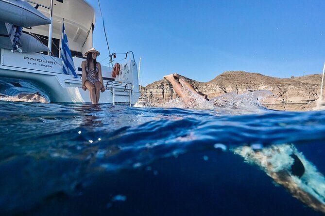 Santorini Oia: Caldera Luxury Day Cruise with BBQ & Drinks - Caldera volcano views: the island’s origin story, from sea level