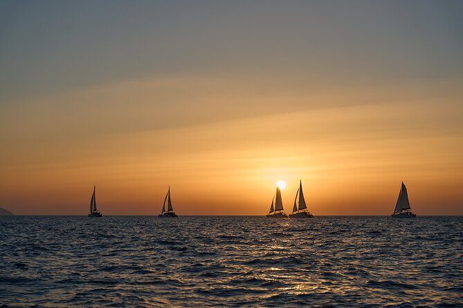 Santorini Oia: Luxury Sunset Cruise with Fresh Fish BBQ & Drinks - The boat ride: comfort, space, and a crew that stays on it