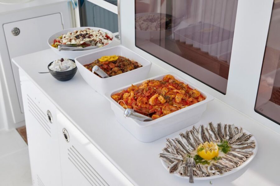 Santorini: Platinum Catamaran Cruise w/ BBQ Meal & Open Bar - A 5-hour Platinum catamaran day that keeps the drama on the horizon