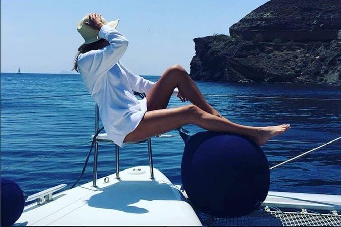 Santorini Platinum Catamaran Cruise with Meal, BBQ and Open Bar - Santorini Volcano Hot Springs: Volcanic Waters and Cave-Spotting Time