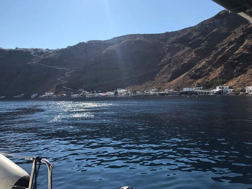 Santorini: Private 5-Hour Sunset Sailing Tour with Dinner - Hot springs area and the calm pacing toward Thirassia