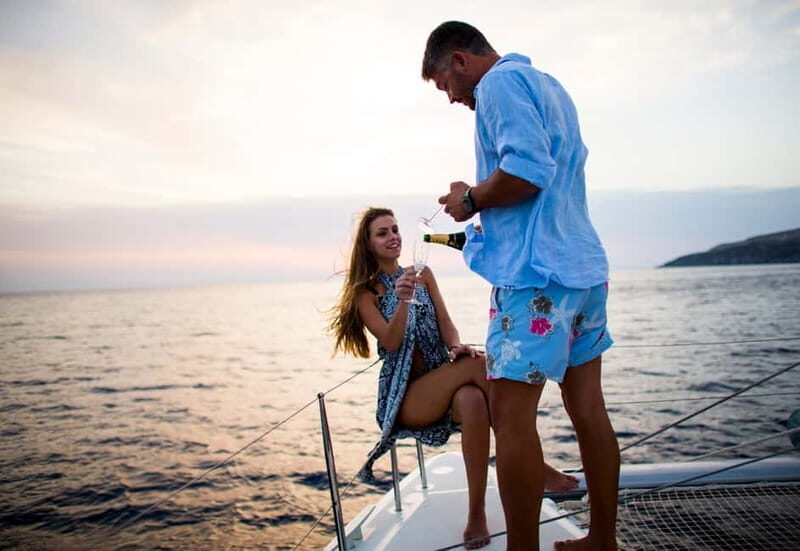 Santorini: Private Catamaran Cruise with BBQ Meal and Drinks - BBQ on the sun deck: food, wine, and a real sense of care