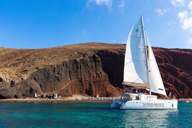 Santorini Private Catamaran Cruise with BBQ, Open Bar & Transfers - Why a private catamaran day from Vlychada feels different