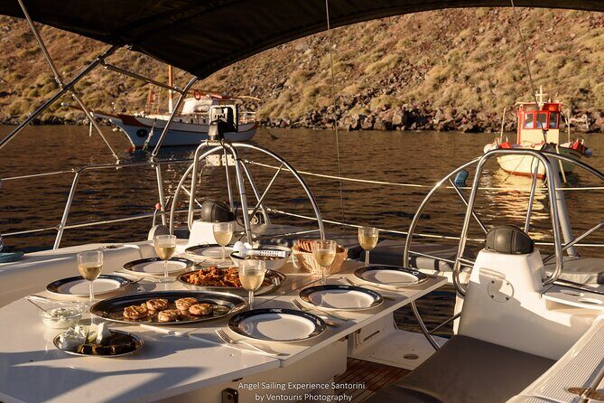 Santorini Private Daytime Sailing Cruise with Meal, Drinks &Transfer included - Volcano Crossing: Cape’s Lighthouse and Hot Springs Views