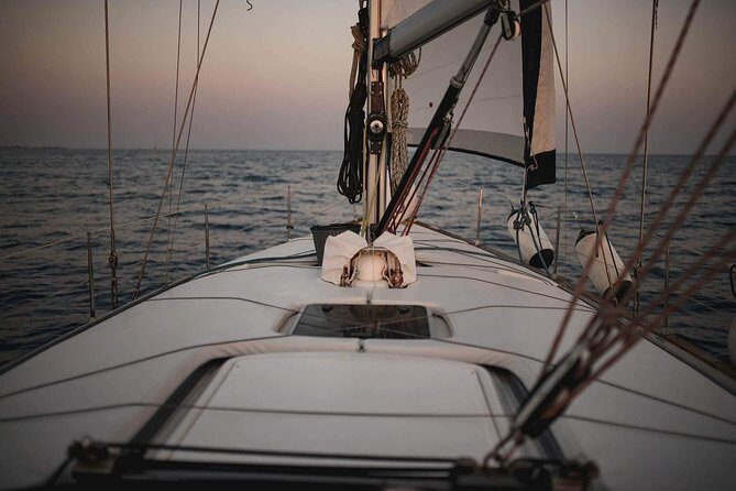 Santorini Private Sunset Sailing Tour with Dinner, Drinks &Transfer included - The White Beach You Can Only Reach by Boat
