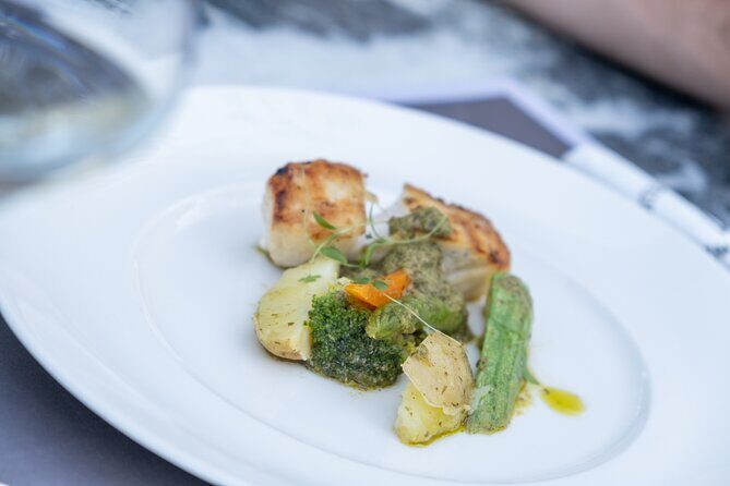 Santorini Private Wine Tour with Dinner & Oia Sunset - Lunch and dinner: Greek food built into the route