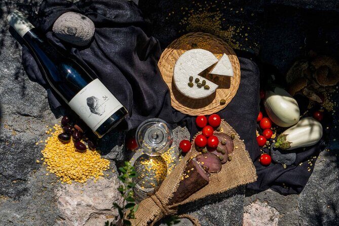 Santorini Private Wine Tour with Dinner & Oia Sunset - Assyrtiko at Artemis Karamolegos in Exo Gonia